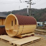 Wooden barrel garden sauna on pallets ready for delivery