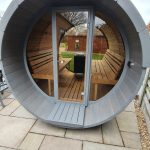 Front interior view of barrel sauna 330 with balcony and benches