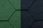 Close-up of hexagonal roof shingles in green and black colours showing textured roofing material