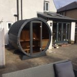 Front view of Terrace Sauna 160 full moon glass installed on patio