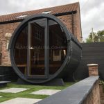 Terrace Sauna 160 full moon glass installed outside modern home