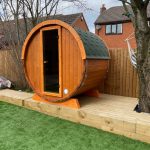 Terrace Sauna 160 standard model installed on wooden decking