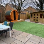 Terrace Sauna 160 standard model installed in a landscaped garden